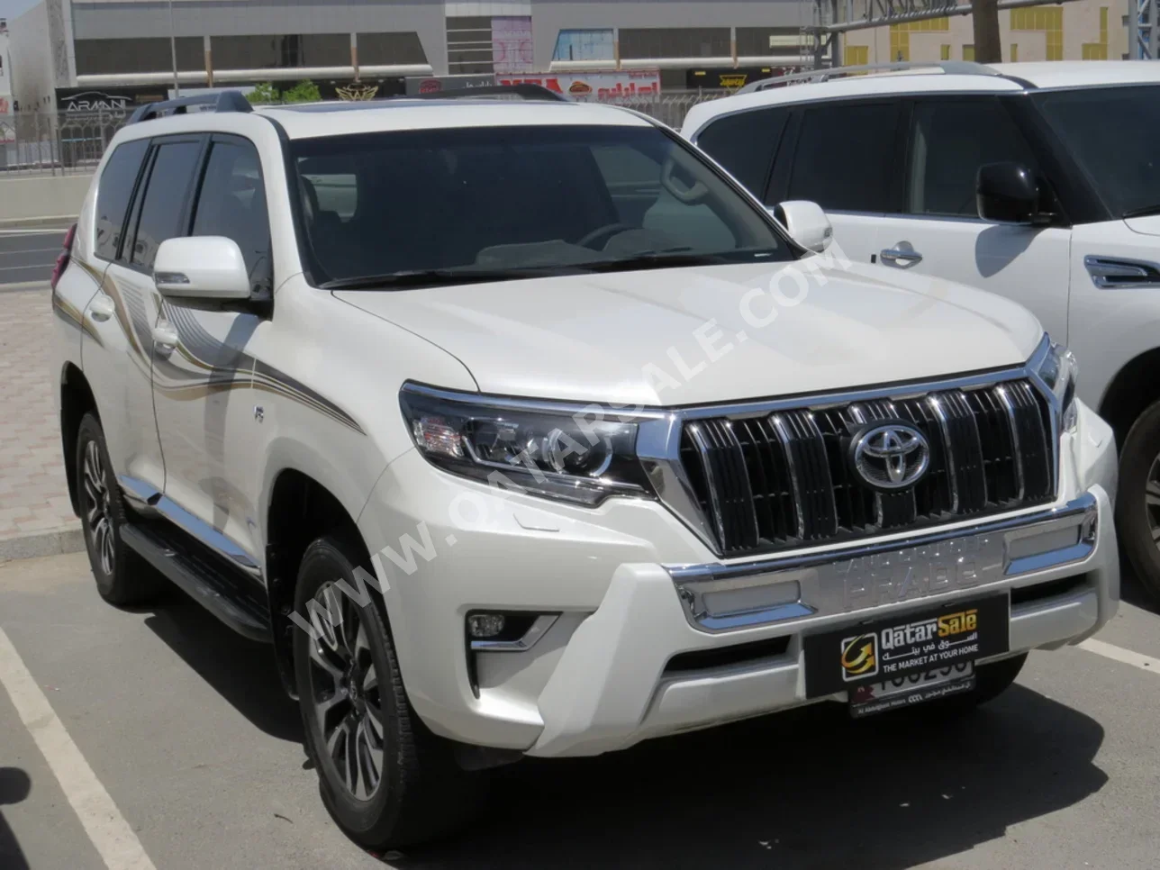  Toyota  Prado  TXL  2023  Automatic  21,000 Km  6 Cylinder  Four Wheel Drive (4WD)  SUV  White  With Warranty