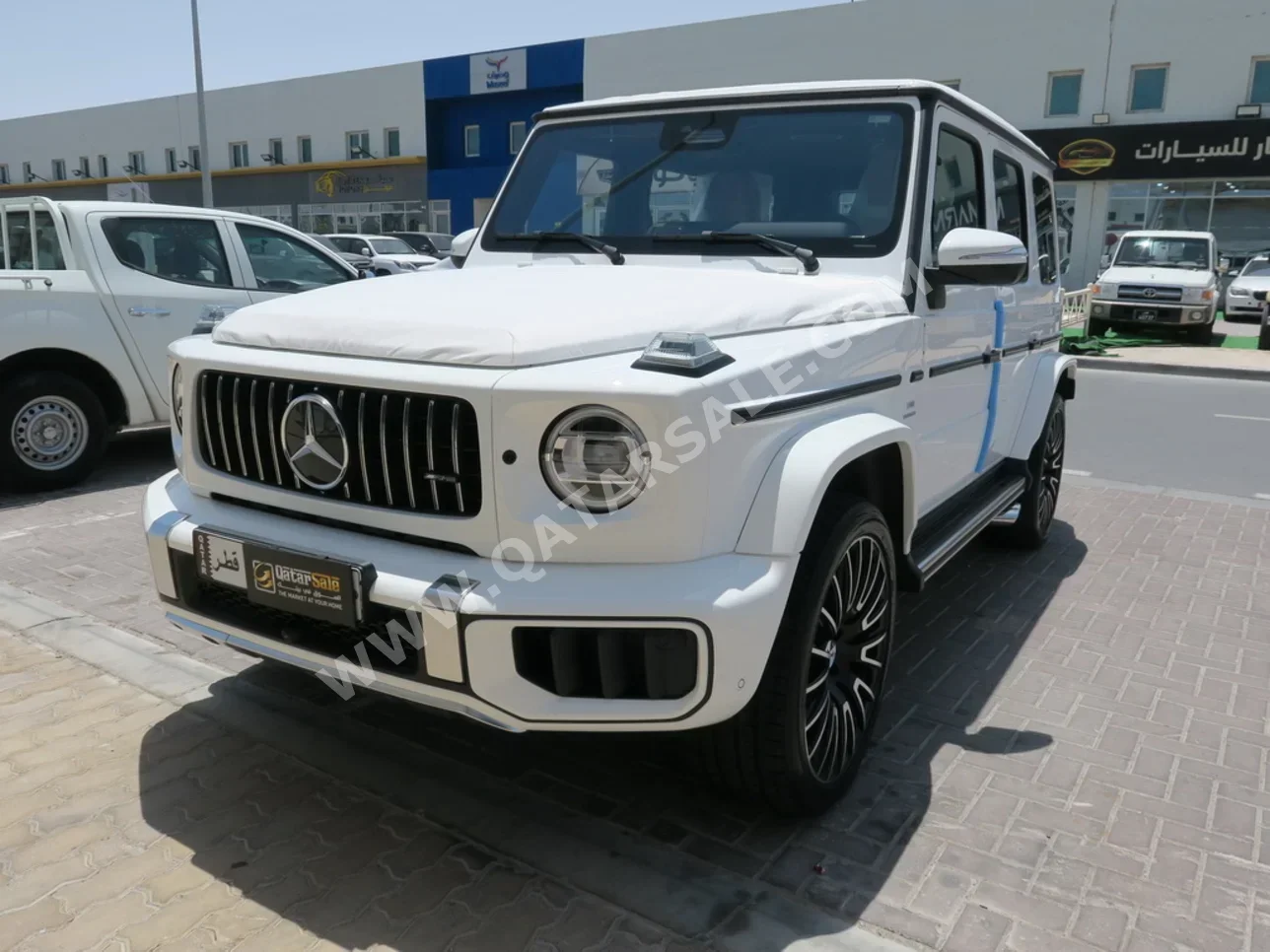 مرسيدس - بنز  جي - كلاس  63 اي ام جي  2025  اوتوماتيك  0 كم  8 سلندر  دفع رباعي  اس يو في  أبيض  تحت الضمان