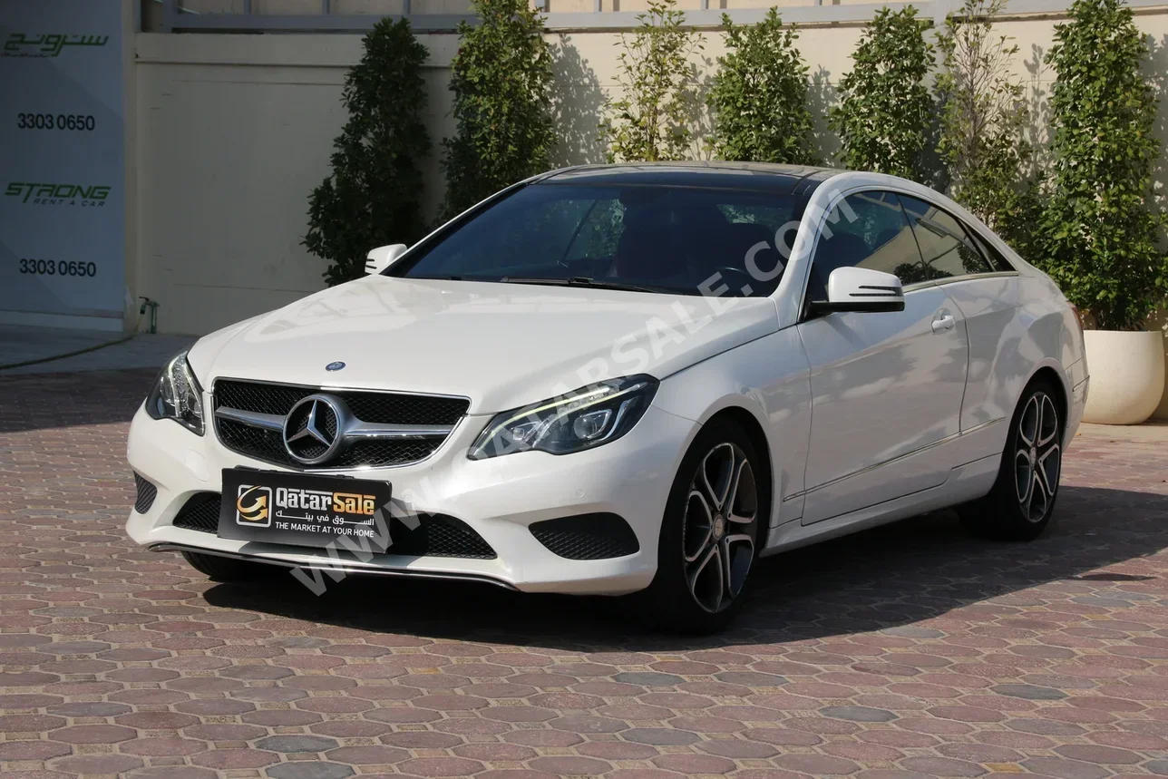 Mercedes-Benz  E-Class  200  2015  Automatic  97,000 Km  4 Cylinder  Rear Wheel Drive (RWD)  Coupe / Sport  Pearl