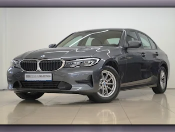 BMW  3-Series  320i  2021  Automatic  72,850 Km  4 Cylinder  Front Wheel Drive (FWD)  Sedan  Gray  With Warranty