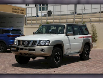 Nissan  Patrol  Super Safari  2021  Automatic  32,000 Km  6 Cylinder  Four Wheel Drive (4WD)  SUV  White  With Warranty