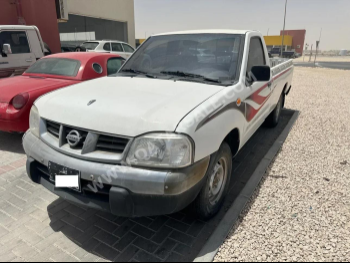 Nissan  Pickup  2007  Manual  215,000 Km  4 Cylinder  Front Wheel Drive (FWD)  Pick Up  White