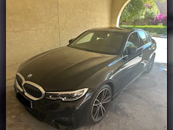 BMW  3-Series  330i  2021  Automatic  37,000 Km  4 Cylinder  Rear Wheel Drive (RWD)  Sedan  Black  With Warranty