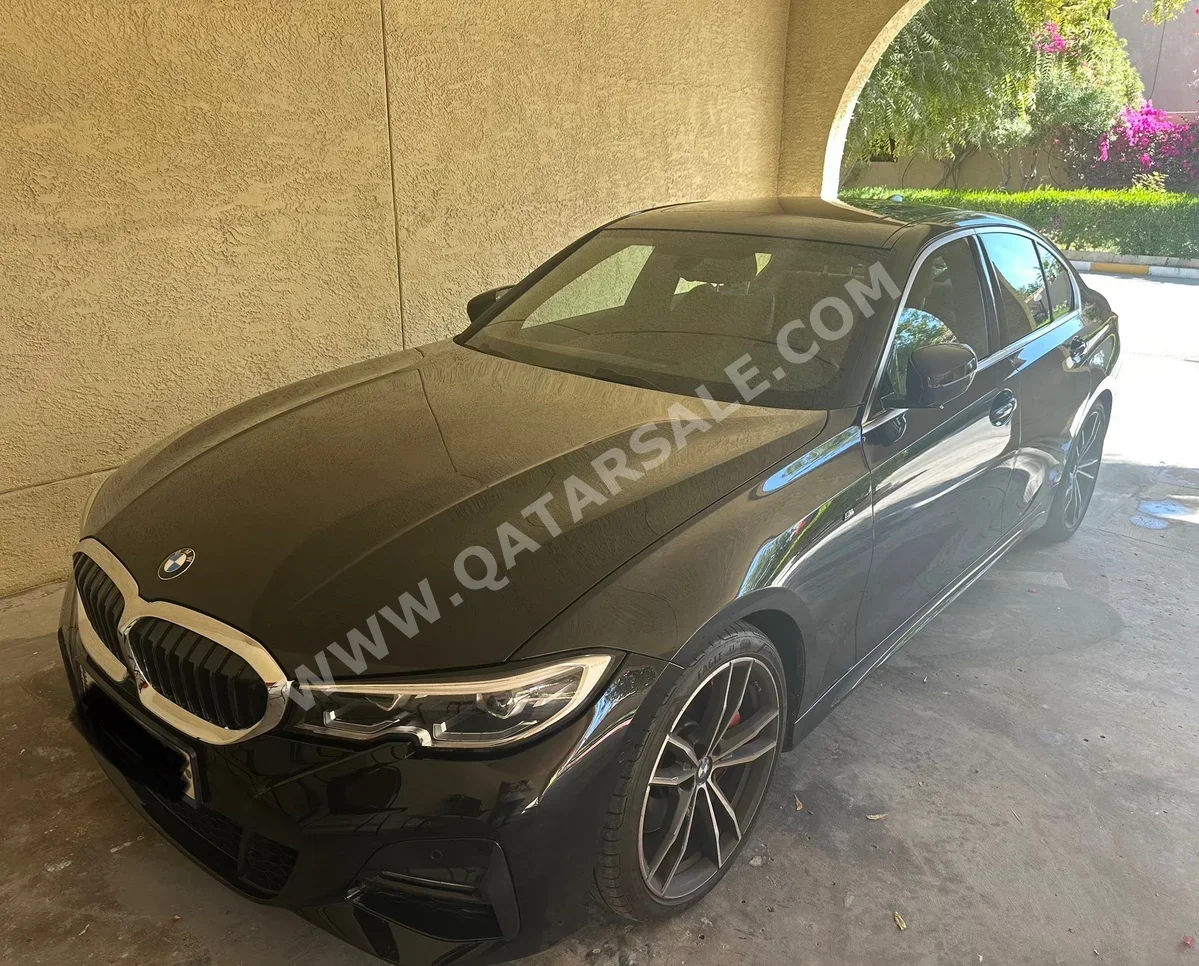 BMW  3-Series  330i  2021  Automatic  37,000 Km  4 Cylinder  Rear Wheel Drive (RWD)  Sedan  Black  With Warranty