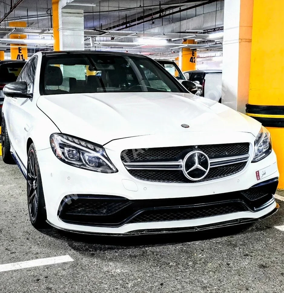 Mercedes-Benz  C-Class  63 AMG  2016  Automatic  84,000 Km  8 Cylinder  Rear Wheel Drive (RWD)  Sedan  White and Black