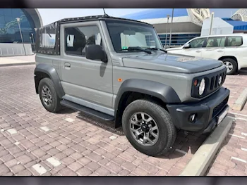 Suzuki  Jimny  2023  Automatic  5,000 Km  4 Cylinder  Four Wheel Drive (4WD)  SUV  Gray