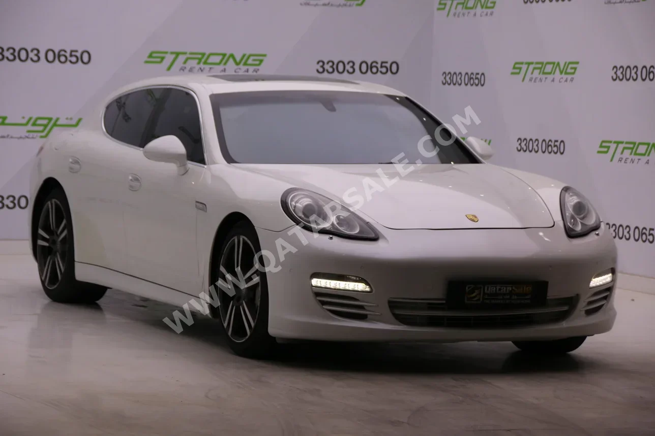 بورش  بانميرا  4S ميدل ايست ايديشن  2011  اوتوماتيك  120,000 كم  8 سلندر  دفع كلي مستمر  سيدان  أبيض