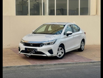 Honda  City  2024  Automatic  25,000 Km  4 Cylinder  Front Wheel Drive (FWD)  Sedan  White  With Warranty