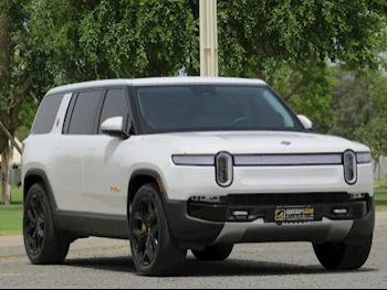 Rivian  R1 S  2023  Automatic  11,000 Km  0 Cylinder  All Wheel Drive (AWD)  SUV  White  With Warranty