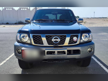 Nissan  Patrol  Super Safari  2021  Automatic  44,000 Km  6 Cylinder  Four Wheel Drive (4WD)  SUV  Black and Gray  With Warranty