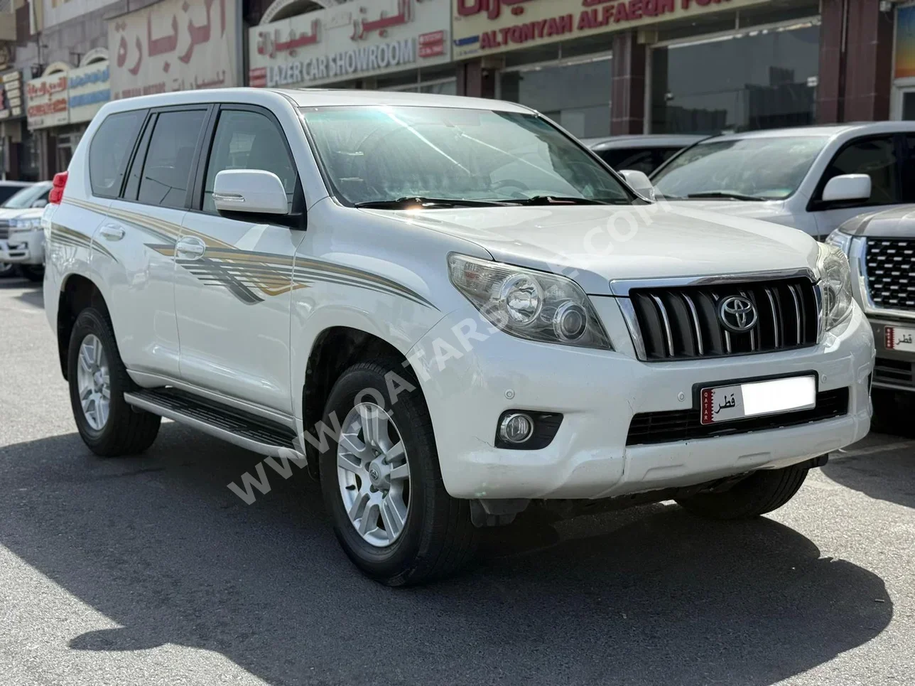 Toyota  Prado  VX  2010  Automatic  300,000 Km  6 Cylinder  Four Wheel Drive (4WD)  SUV  White