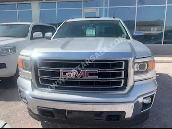 GMC  Sierra  SLE  2015  Automatic  110,000 Km  8 Cylinder  Four Wheel Drive (4WD)  Pick Up  Silver