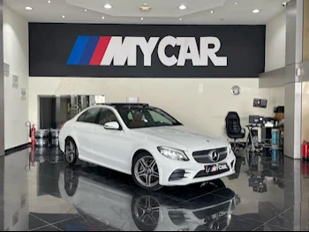 Mercedes-Benz  C-Class  200 AMG  2019  Automatic  34,000 Km  4 Cylinder  Rear Wheel Drive (RWD)  Sedan  White