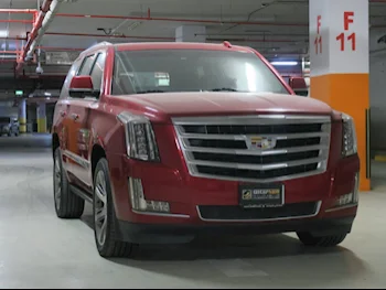 Cadillac  Escalade  2015  Automatic  28,000 Km  8 Cylinder  Four Wheel Drive (4WD)  SUV  Red