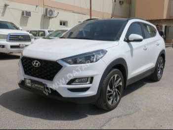 Hyundai  Tucson  2021  Automatic  122,000 Km  4 Cylinder  Front Wheel Drive (FWD)  SUV  White