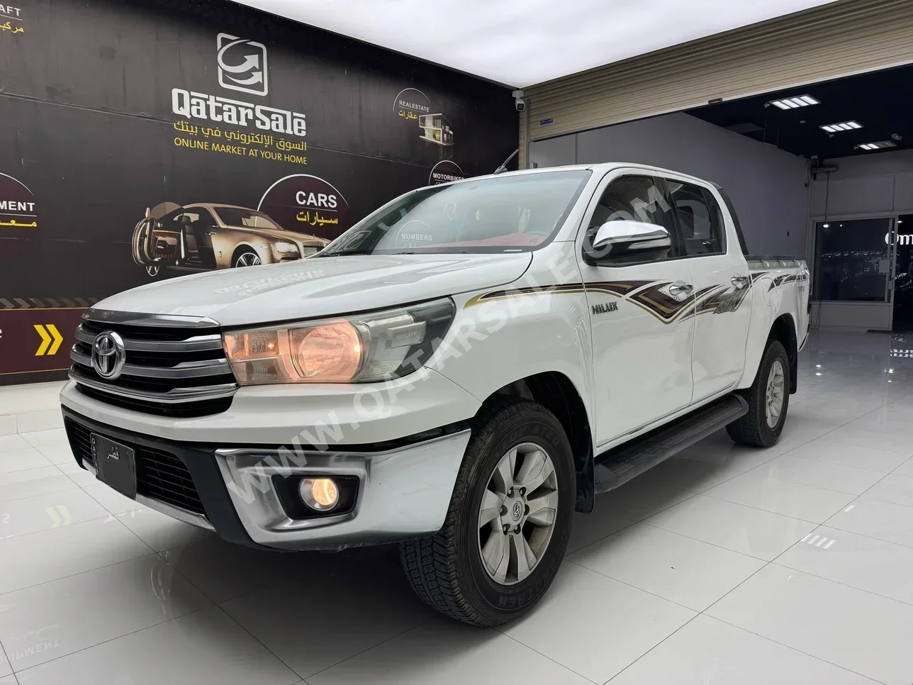 Toyota  Hilux  SR5  2016  Automatic  386,000 Km  4 Cylinder  Four Wheel Drive (4WD)  Pick Up  White
