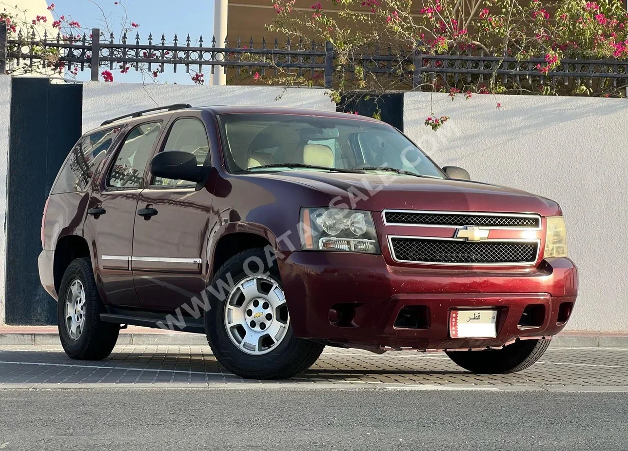 Chevrolet  Tahoe  LS  2011  Automatic  300,000 Km  8 Cylinder  Rear Wheel Drive (RWD)  SUV  Red