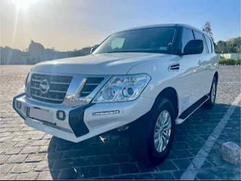 Nissan  Patrol  XE  2018  Automatic  130,000 Km  6 Cylinder  Four Wheel Drive (4WD)  SUV  White