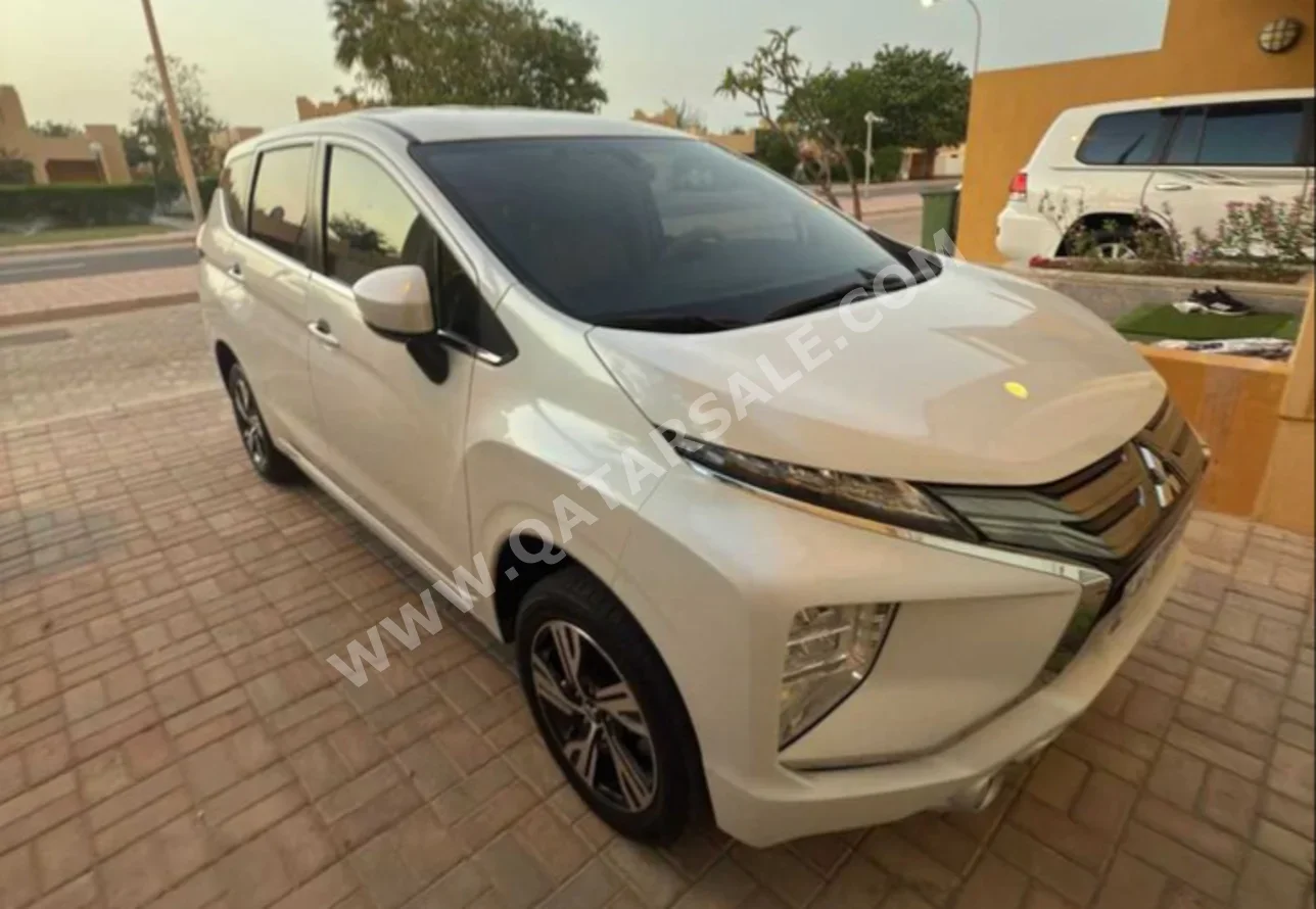 Mitsubishi  Xpander  2021  Automatic  56,700 Km  4 Cylinder  Front Wheel Drive (FWD)  SUV  White