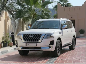Nissan  Patrol  Platinum  2022  Automatic  40,000 Km  8 Cylinder  Four Wheel Drive (4WD)  SUV  White  With Warranty