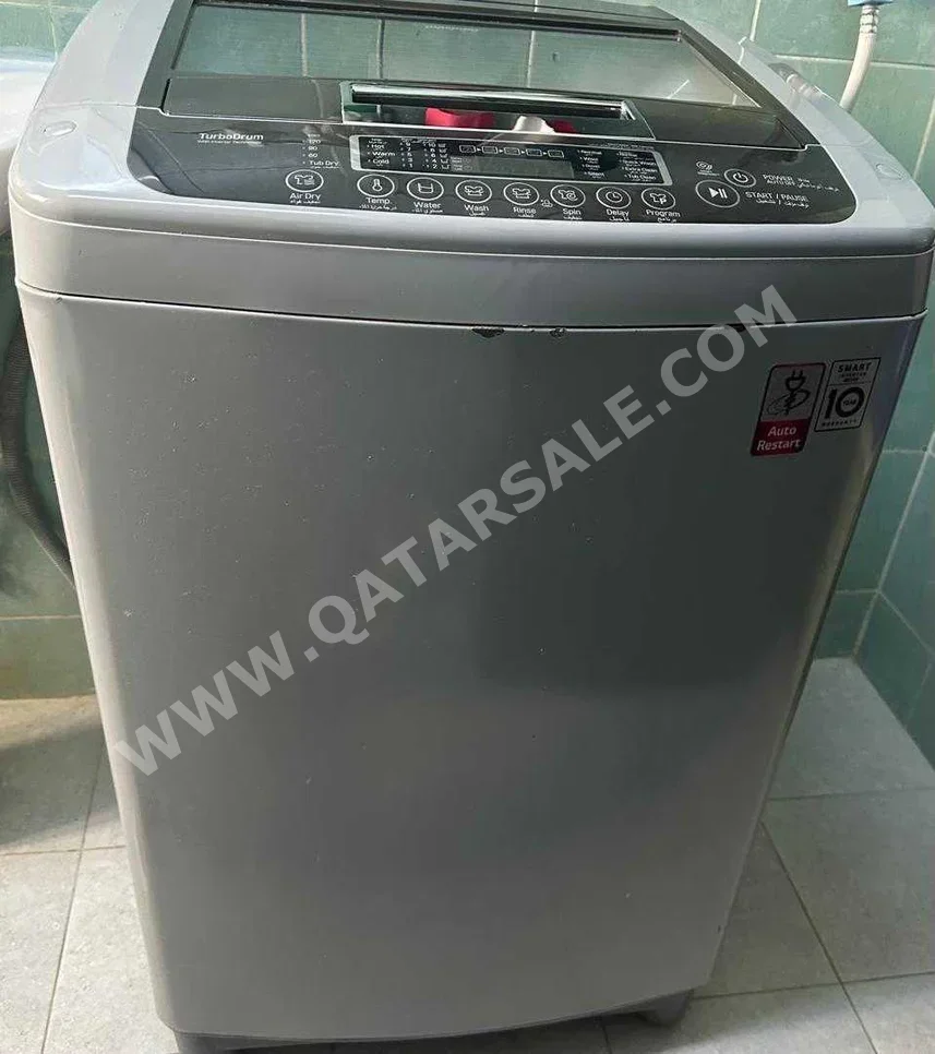غسالة ملابس & الكل في واحد ال جي \  غسالة تحميل علوي  اللون الرمادي