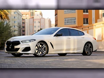 BMW  8-Series  840 i  2020  Automatic  92,000 Km  6 Cylinder  Rear Wheel Drive (RWD)  Sedan  White