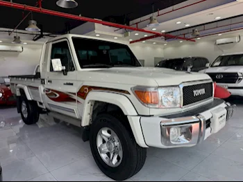 Toyota  Land Cruiser  LX  2011  Manual  344,000 Km  6 Cylinder  Four Wheel Drive (4WD)  Pick Up  White