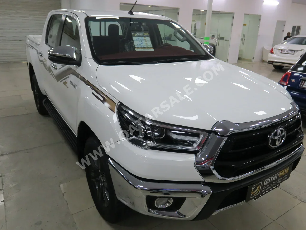 Toyota  Hilux  2024  Automatic  43,000 Km  4 Cylinder  Four Wheel Drive (4WD)  Pick Up  White  With Warranty
