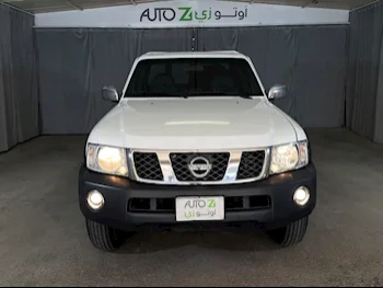 نيسان  باترول  بيك اب  2012  عادي  150,200 كم  6 سلندر  دفع رباعي  بيكب  أبيض