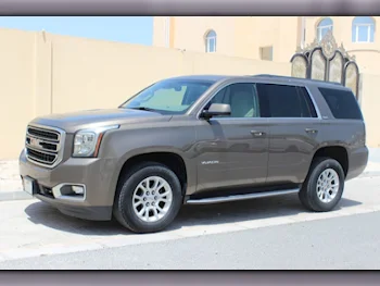GMC  Yukon  SLE  2016  Automatic  182,000 Km  8 Cylinder  Rear Wheel Drive (RWD)  SUV  Gray