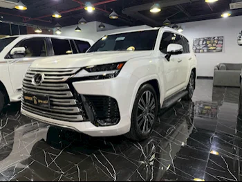 Lexus  LX  600 Luxury  2023  Automatic  31,000 Km  6 Cylinder  Four Wheel Drive (4WD)  SUV  White  With Warranty