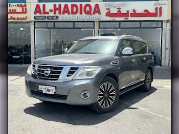 Nissan  Patrol  Platinum  2016  Automatic  138,000 Km  8 Cylinder  Four Wheel Drive (4WD)  SUV  Gray