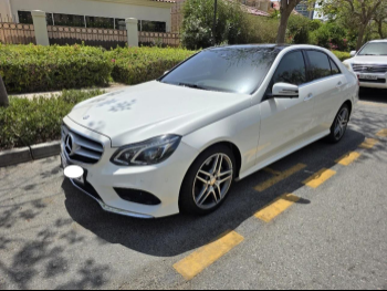 Mercedes-Benz  E-Class  400  2016  Automatic  111,000 Km  6 Cylinder  Rear Wheel Drive (RWD)  Sedan  White
