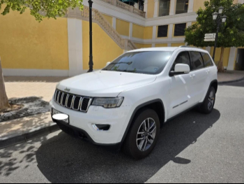 Jeep  Grand Cherokee  Laredo  2020  Automatic  49,000 Km  6 Cylinder  Four Wheel Drive (4WD)  SUV  White  With Warranty