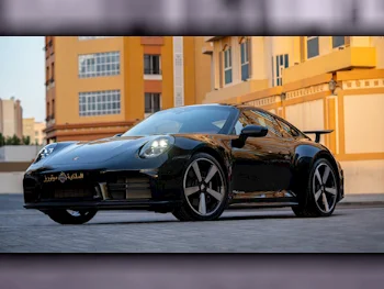 Porsche  911  Carrera  2025  Automatic  0 Km  6 Cylinder  Rear Wheel Drive (RWD)  Coupe / Sport  Black  With Warranty