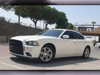 Dodge  Charger  2011  Tiptronic  264,000 Km  6 Cylinder  Rear Wheel Drive (RWD)  Sedan  White