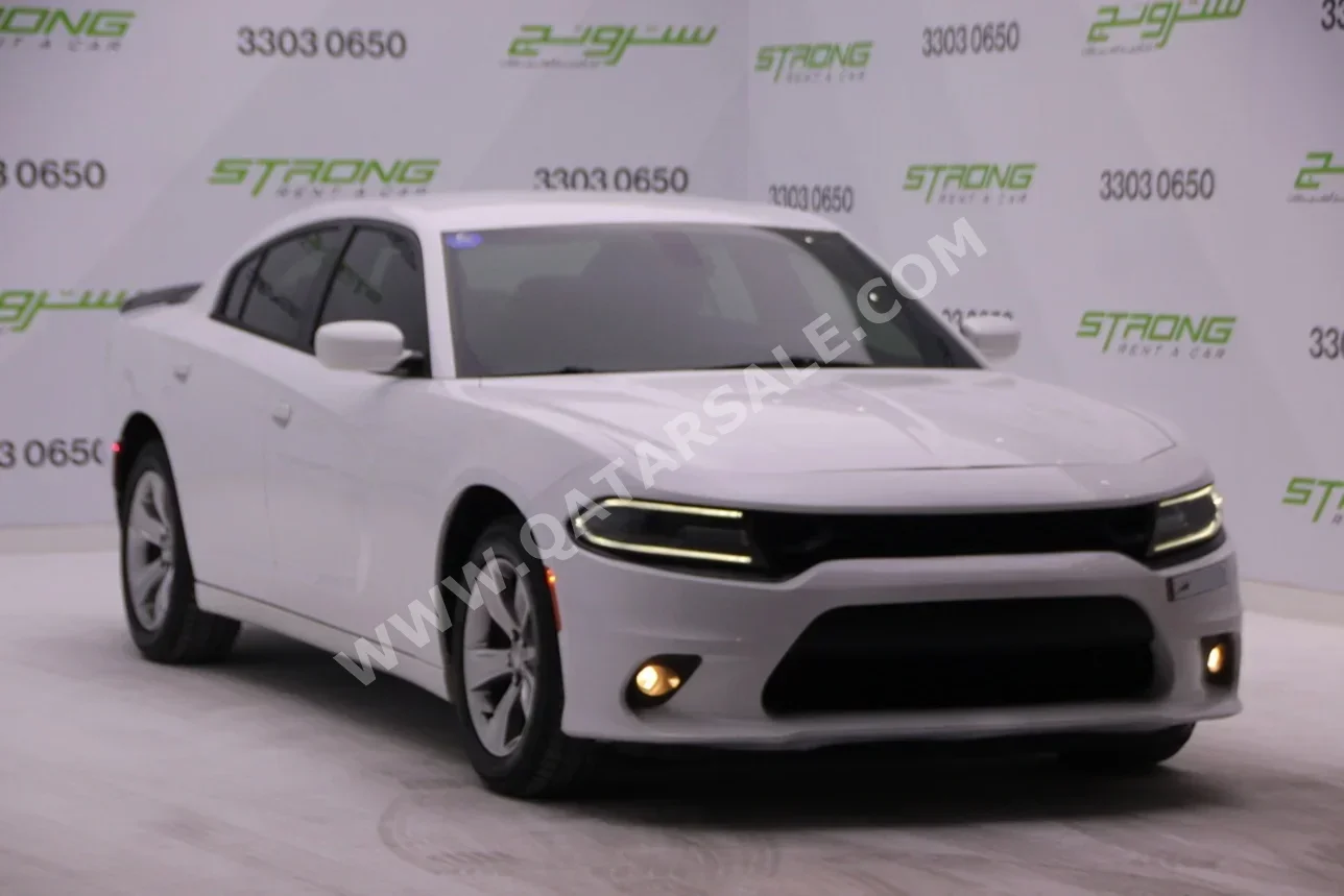 Dodge  Charger  SXT  2015  Automatic  95,700 Km  6 Cylinder  Rear Wheel Drive (RWD)  Sedan  White