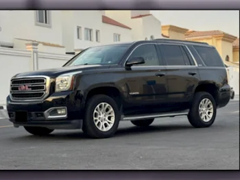 GMC  Yukon  SLE  2015  Automatic  225,000 Km  8 Cylinder  Rear Wheel Drive (RWD)  SUV  Black
