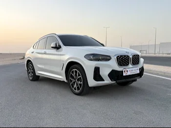 BMW  X-Series  X4 M  2024  Automatic  38,000 Km  4 Cylinder  All Wheel Drive (AWD)  SUV  White  With Warranty
