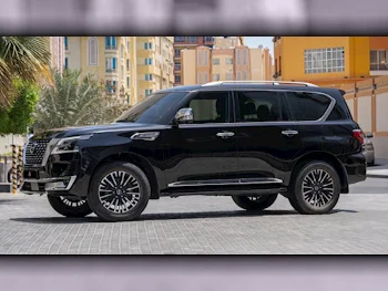 Nissan  Patrol  Platinum  2022  Automatic  77,000 Km  6 Cylinder  Four Wheel Drive (4WD)  SUV  Black