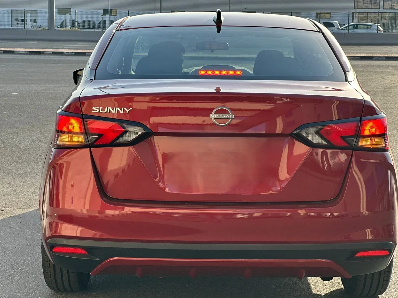 Nissan  Sunny  4 Cylinder  Sedan  Dark Red  2024