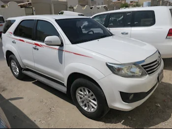 Toyota  Fortuner  2015  Automatic  95,000 Km  4 Cylinder  Four Wheel Drive (4WD)  SUV  White