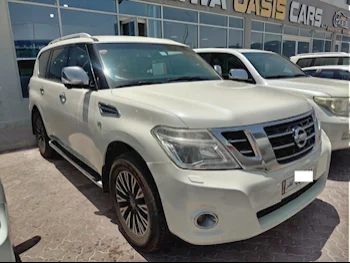 Nissan  Patrol  Platinum  2014  Automatic  161,000 Km  8 Cylinder  Four Wheel Drive (4WD)  SUV  White