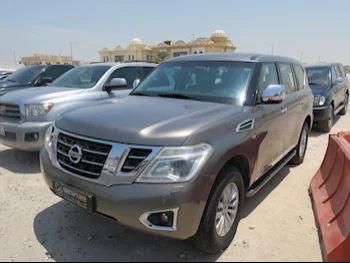 Nissan  Patrol  SE  2015  Automatic  209,000 Km  8 Cylinder  Four Wheel Drive (4WD)  SUV  Brown