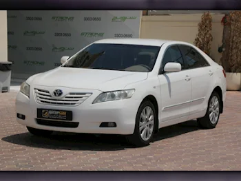 تويوتا  كامري  جي ال اكس  2009  اوتوماتيك  107,000 كم  4 سلندر  سحب امامي  سيدان  أبيض لؤلؤي