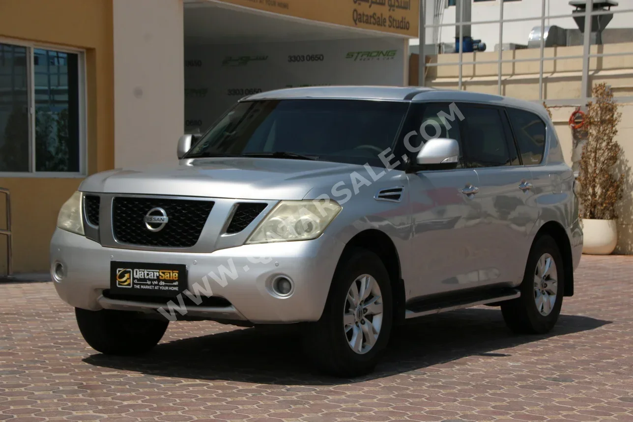 Nissan  Patrol  SE  2012  Automatic  261,000 Km  8 Cylinder  Four Wheel Drive (4WD)  SUV  Silver