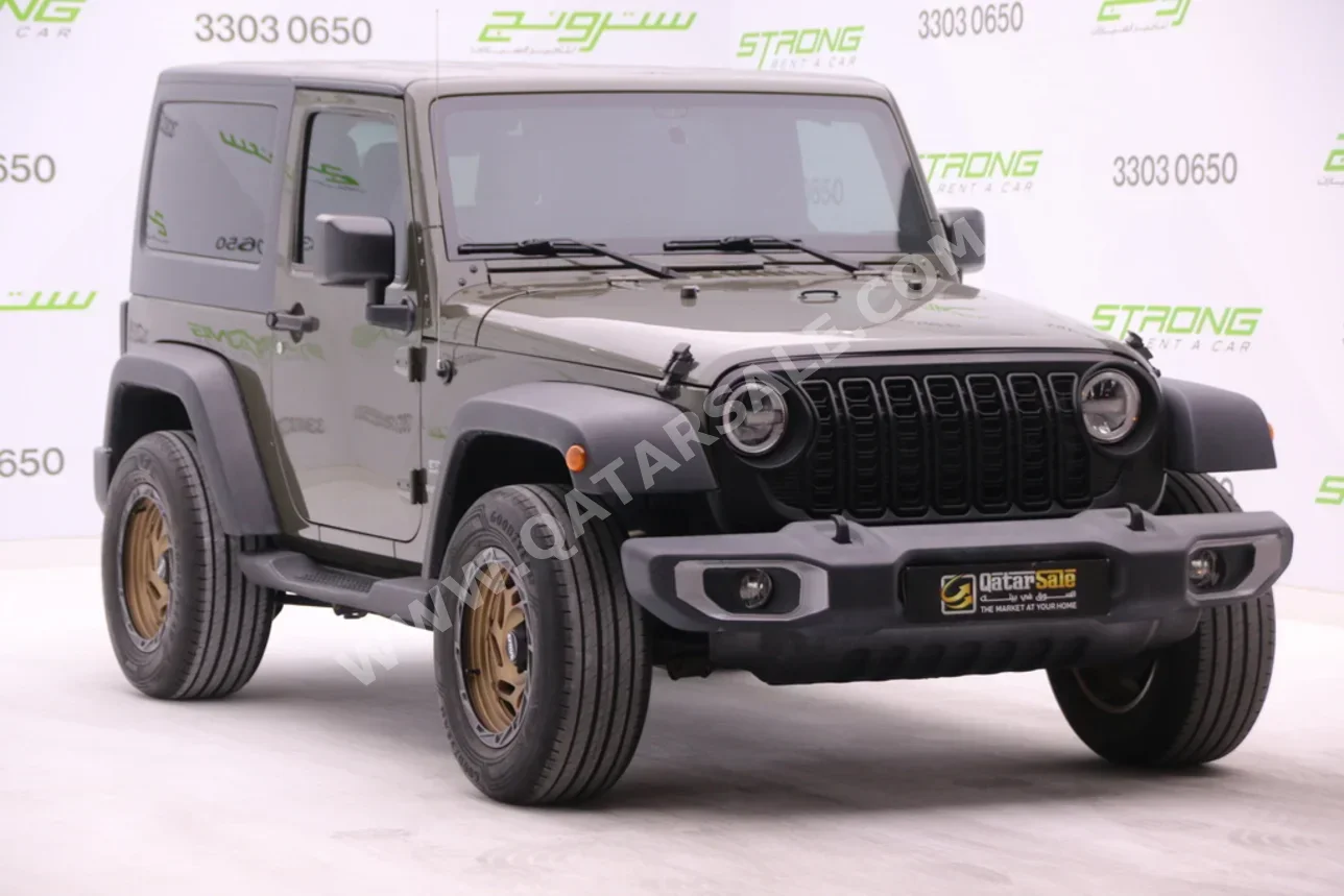 Jeep  Wrangler  Sport  2015  Automatic  124,000 Km  6 Cylinder  Four Wheel Drive (4WD)  SUV  Green