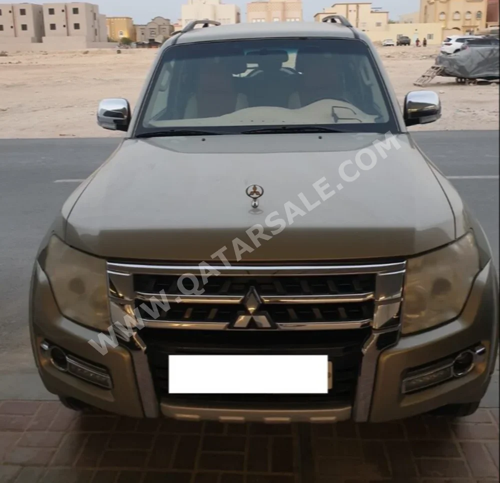 Mitsubishi  Pajero  2015  Automatic  127,000 Km  6 Cylinder  Four Wheel Drive (4WD)  SUV  Beige