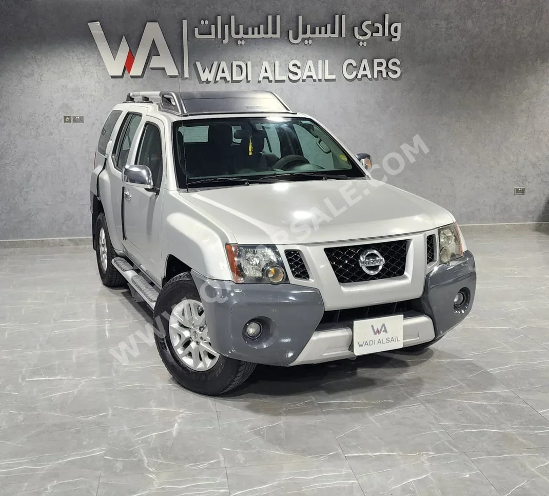 Nissan  Xterra  2012  Automatic  440,000 Km  6 Cylinder  Four Wheel Drive (4WD)  SUV  Silver