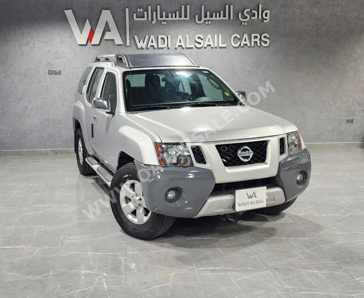 Nissan  Xterra  2014  Automatic  336,000 Km  6 Cylinder  Four Wheel Drive (4WD)  SUV  Silver